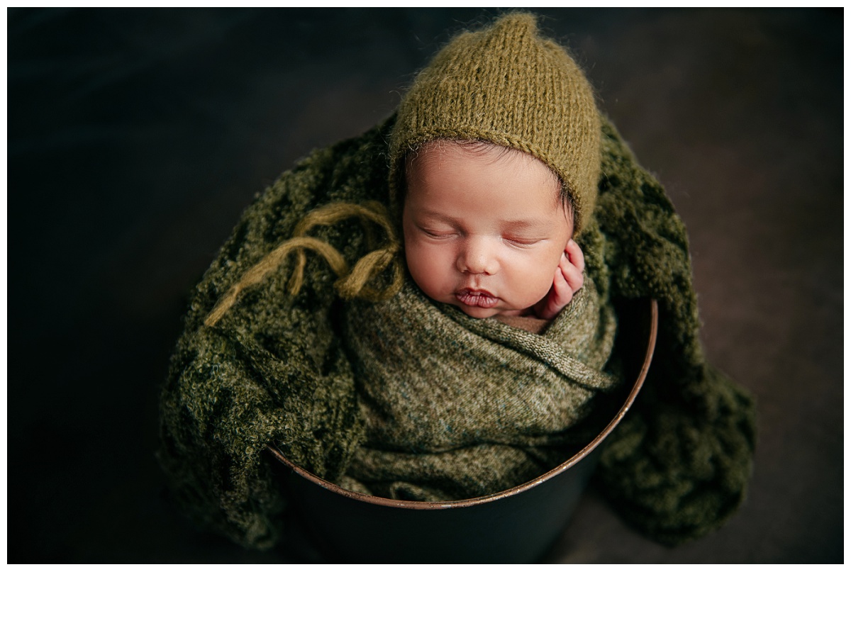 Newborn photography session Kent Island studio green wrap green hat baby in bucket