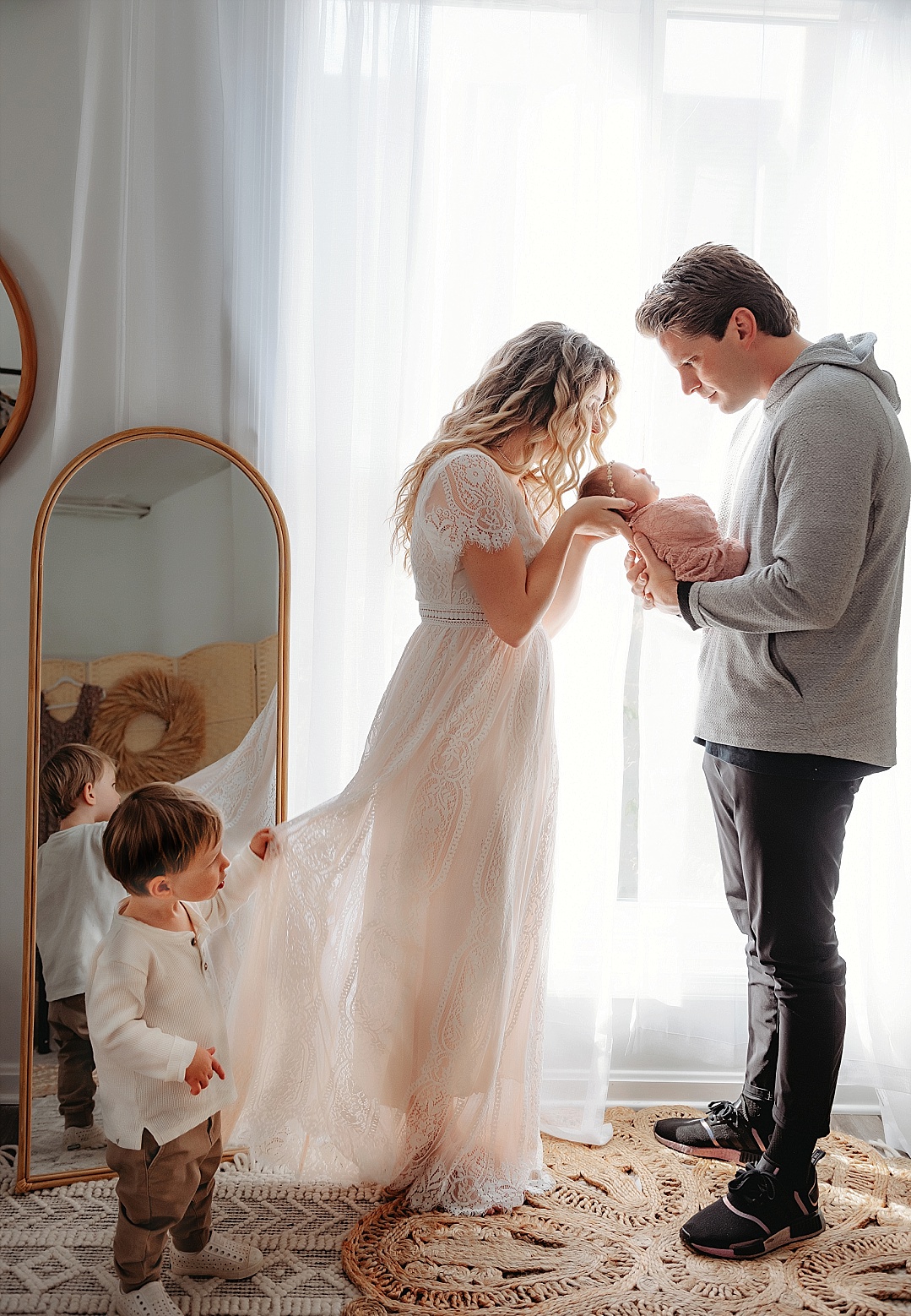 boho newborn photogrpahy session with sibling older brother in Stevensville MD studio