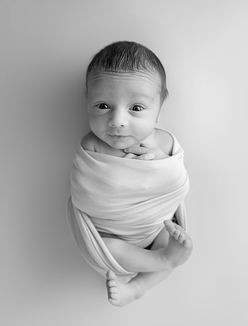 black and white baby portrait personality photo in Kent Island studio