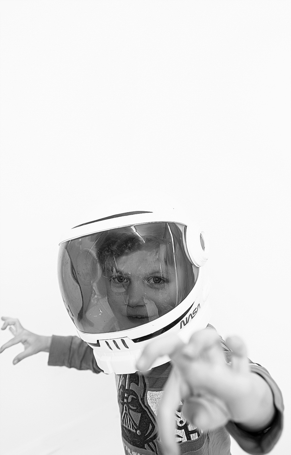 boy with astronaut helmet black and white personality photo